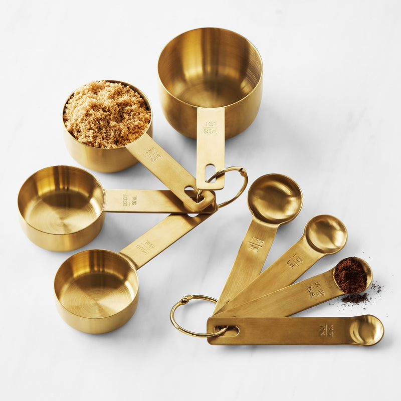 WILLIAM SONOMA GOLD MEASURING CUPS AND SPOONS