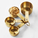 WILLIAM SONOMA GOLD MEASURING CUPS AND SPOONS
